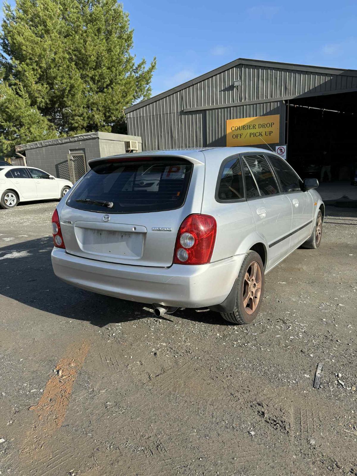View Auto part Engine Mazda 323 2003