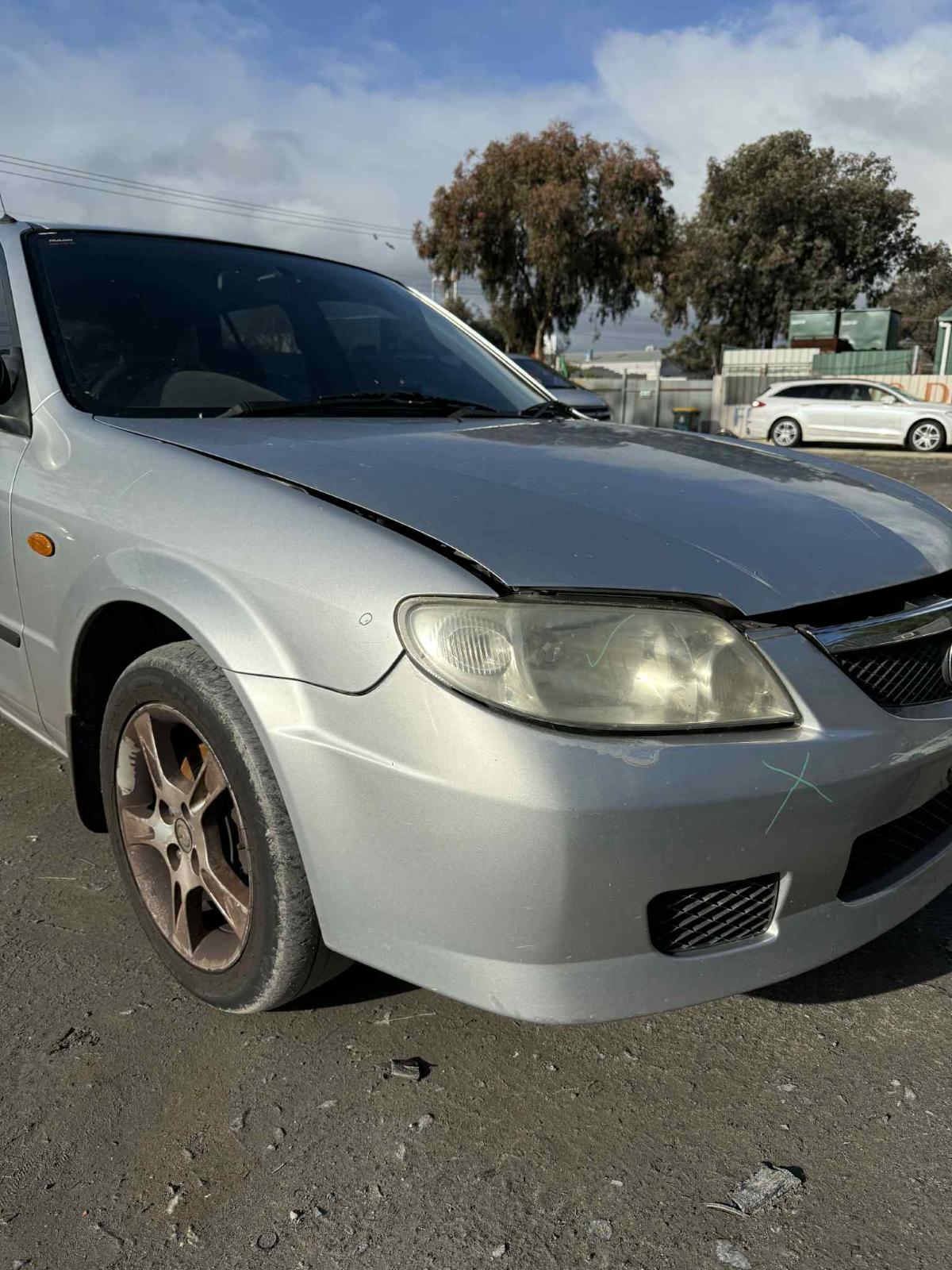 View Auto part Engine Mazda 323 2003