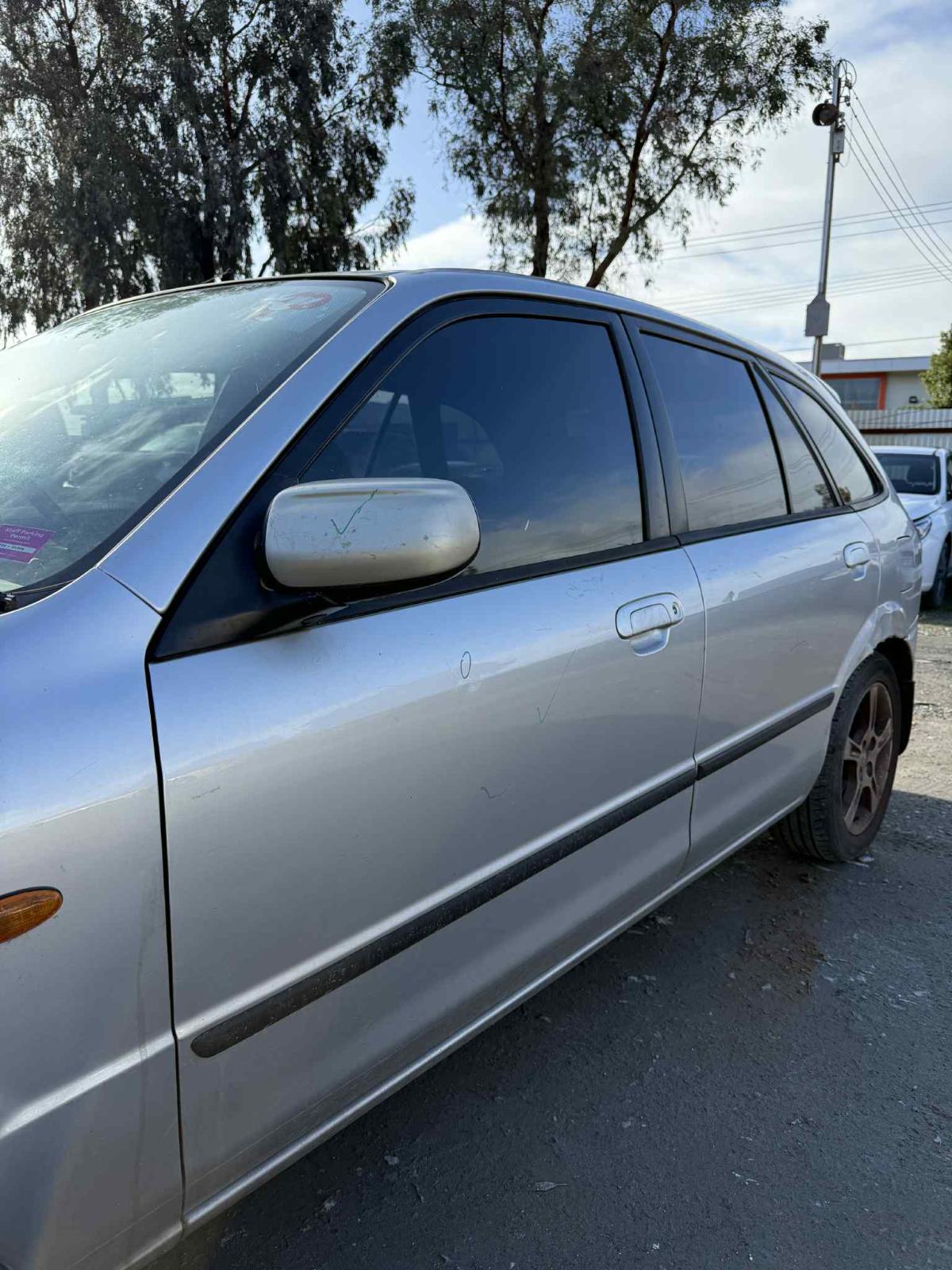 View Auto part Engine Mazda 323 2003
