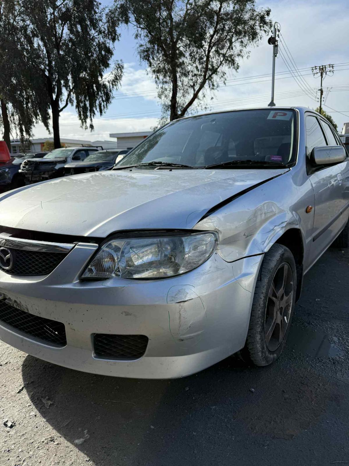 View Auto part Engine Mazda 323 2003