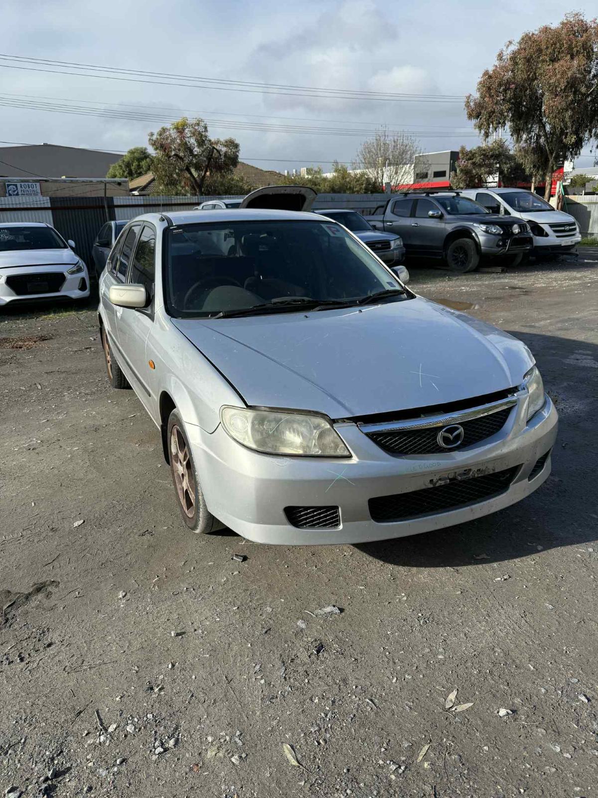 View Auto part Engine Mazda 323 2003